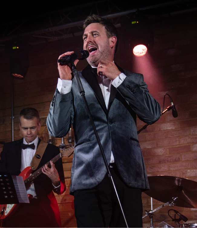 Lead vocalist performing on stage